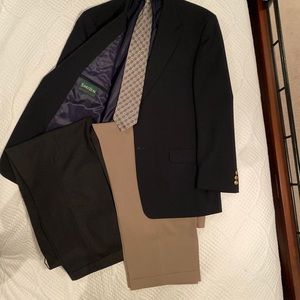Savile Row Navy Blazer and 2 pr slacks cuffed with tie.